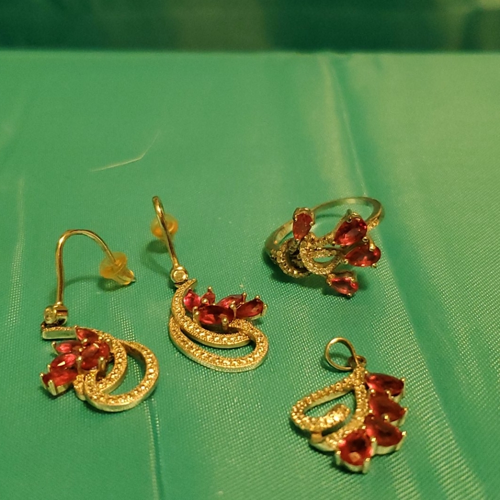 Womens size 9 ruby ring, earrings and pendant set